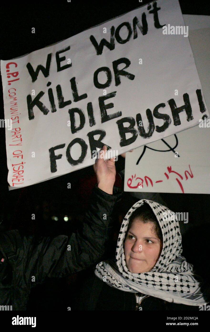 A left-wing Israeli activist takes part in a protest outside the U.S. Consulate in Jerusalem, January 9, 2008. U.S. President George W. Bush on Wednesday began his first visit as U.S. president to Israel and the Palestinian territories, saying he saw a new opportunity for peace and that both sides were ready to make tough concessions. REUTERS/Eliana Aponte (JERUSALEM) Stock Photo