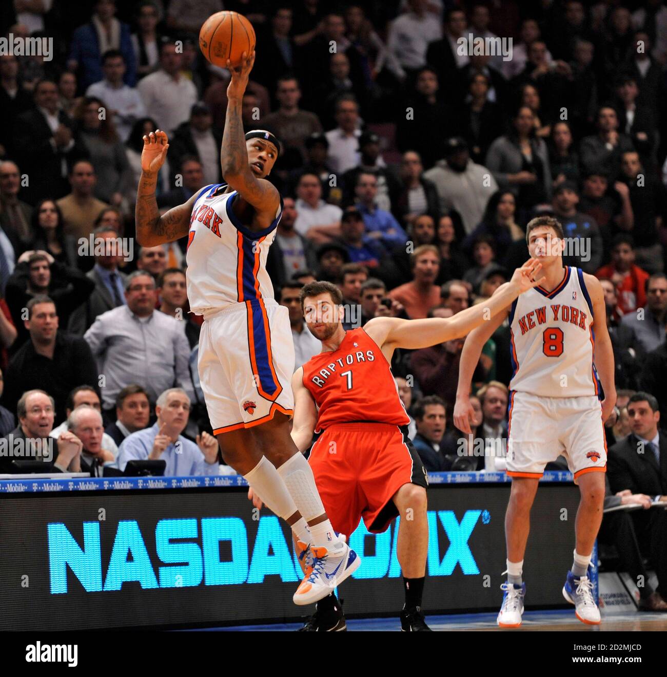 New York Knicks forward Al Harrington (L) barely controls an ...