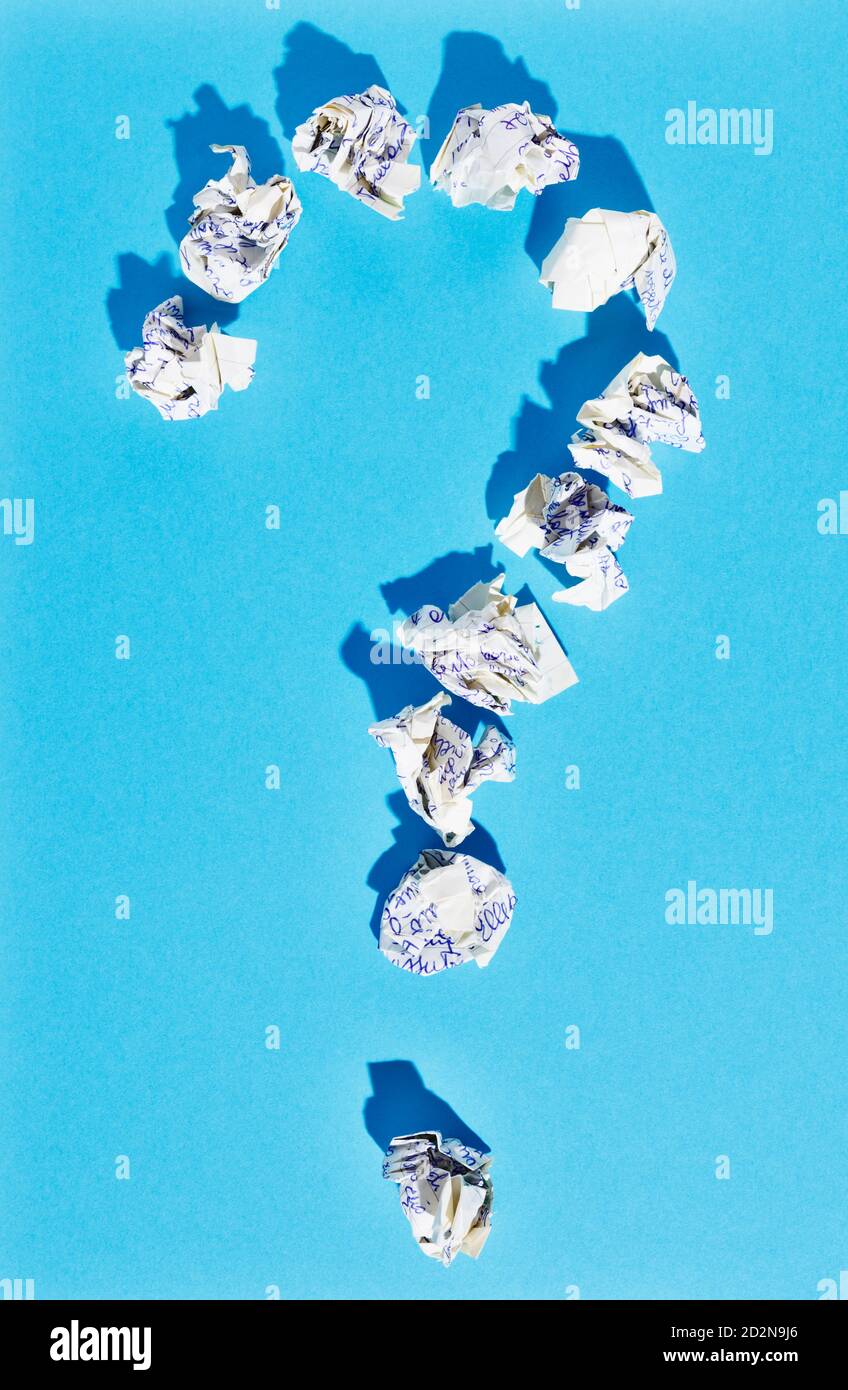 Question mark on blue background Stock Photo