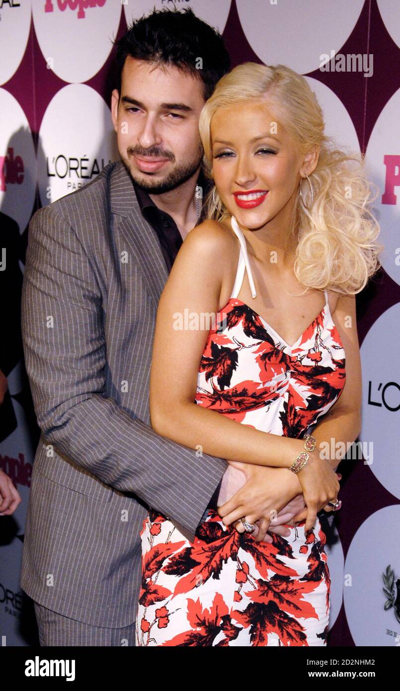Singer Christina Aguilera and her husband Jordan Bratman pose together at a  post-Grammy Awards party hosted by Beyonce and People magazine in West  Hollywood, California, February 11, 2007. REUTERS/Chris Pizzello (UNITED  STATES