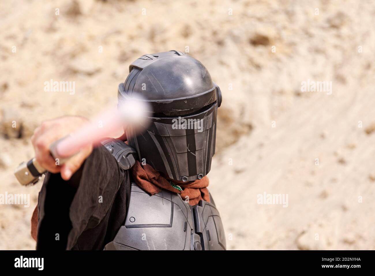 Umea, Norrland Sweden - August 14, 2020: character from the future with lightsaber Stock Photo