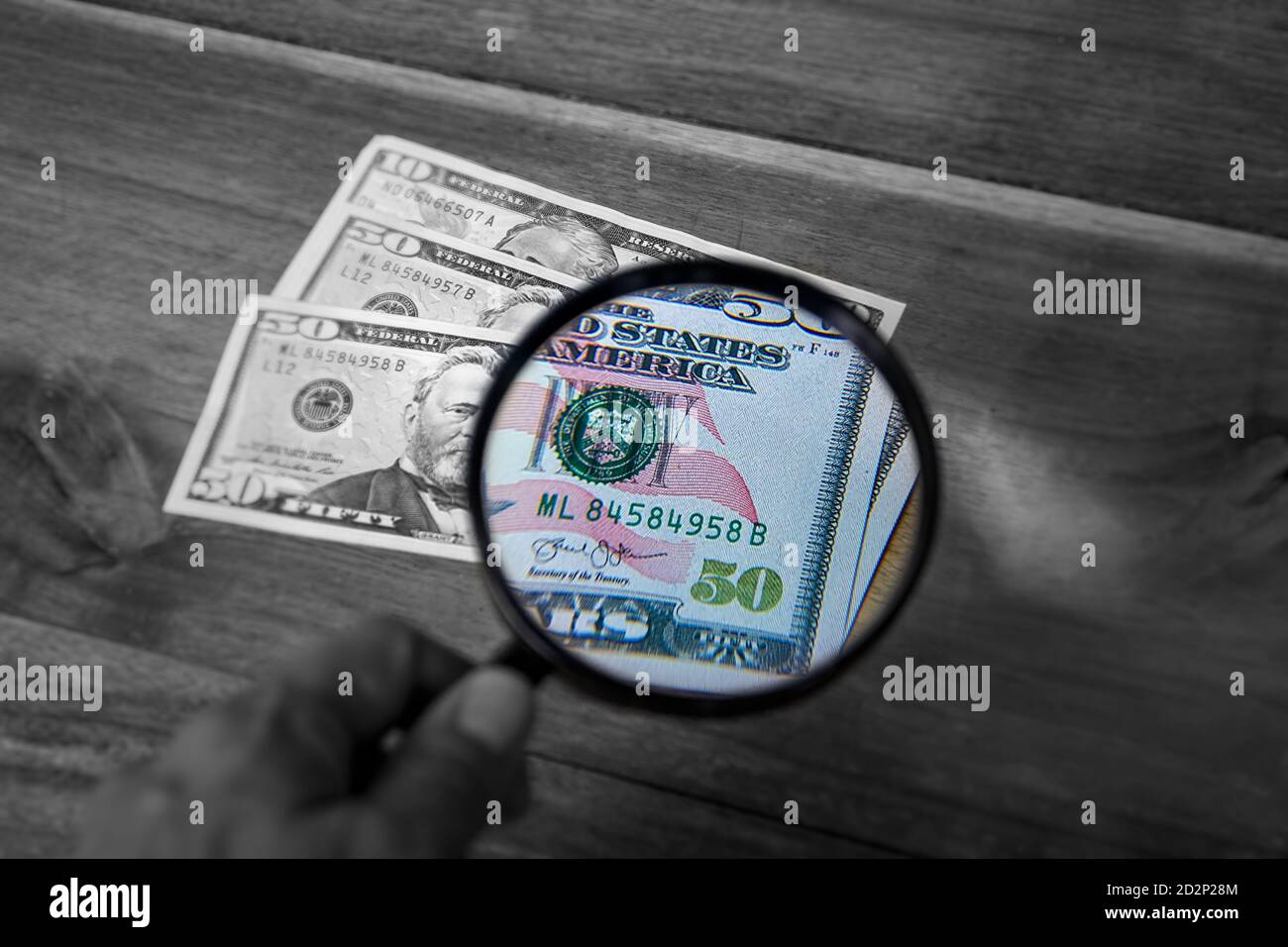 Enlarged glass hi-res stock photography and images - Alamy