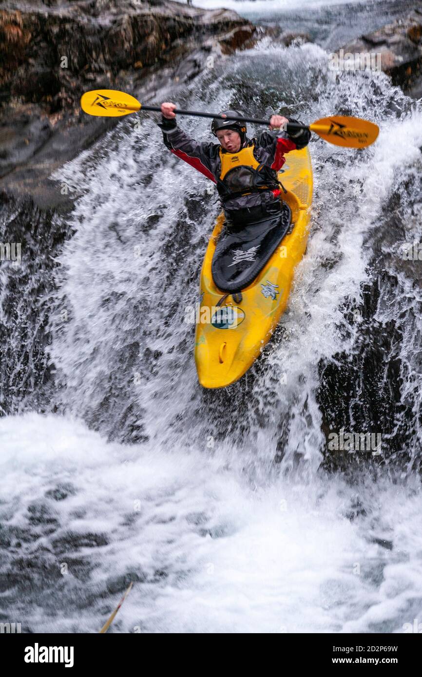 Canoeist in White Water, Snowdonia, North Wales Stock Photo