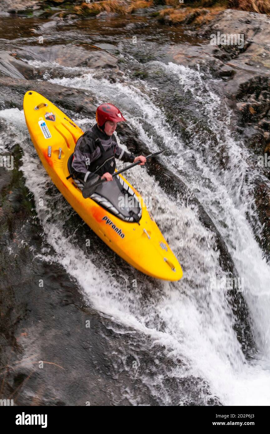 Canoeist in White Water, Snowdonia, North Wales Stock Photo