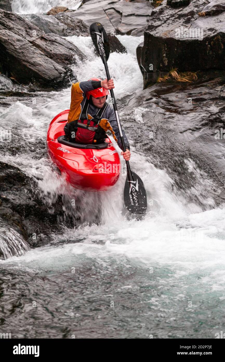 Canoeist in White Water, Snowdonia, North Wales Stock Photo