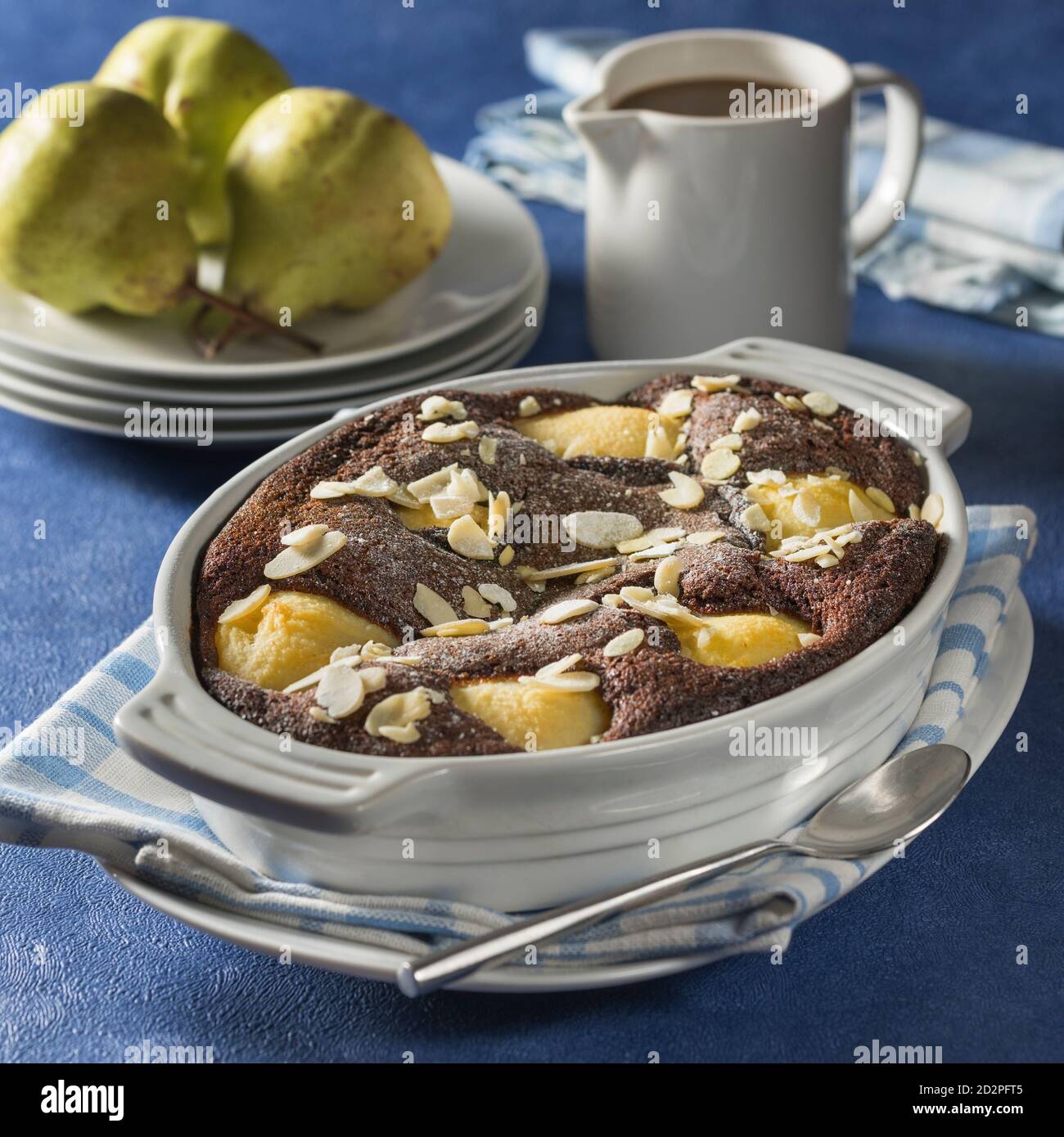 Pear and chocolate pudding. Stock Photo