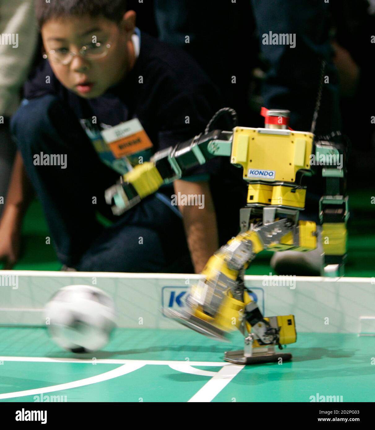 Robot playing soccer hi-res stock photography and images - Alamy