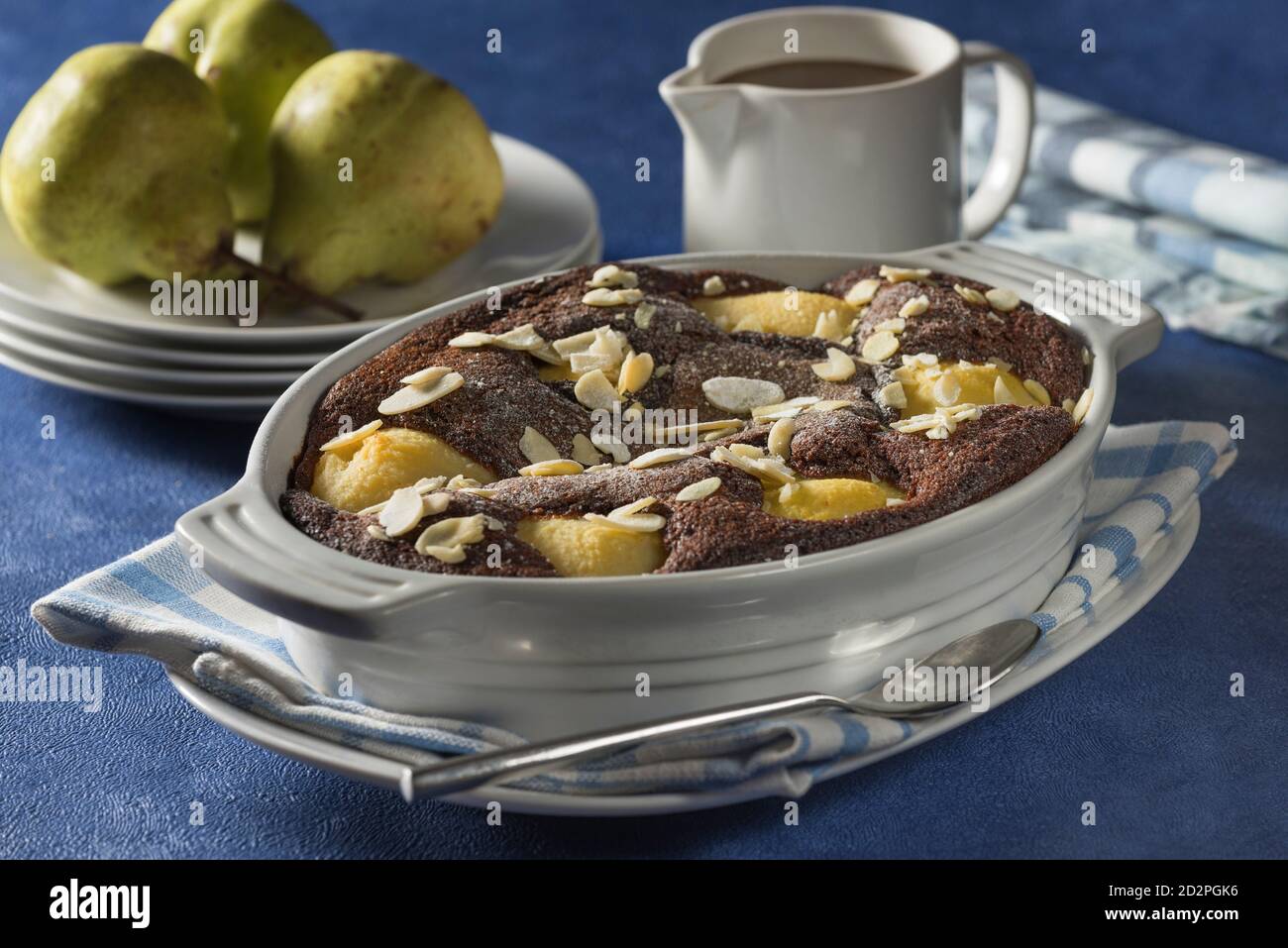 Pear and chocolate pudding. Stock Photo