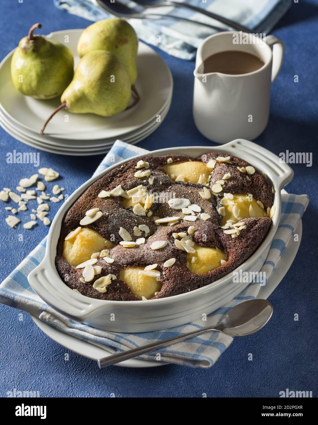 Pear and chocolate pudding. Stock Photo