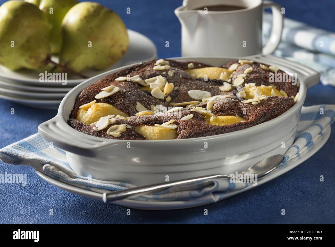 Pear and chocolate pudding. Stock Photo