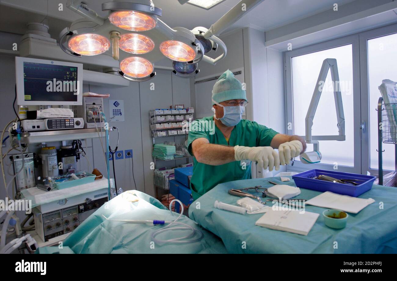 A French oral surgeon performs maxillofacial reconstruction surgery