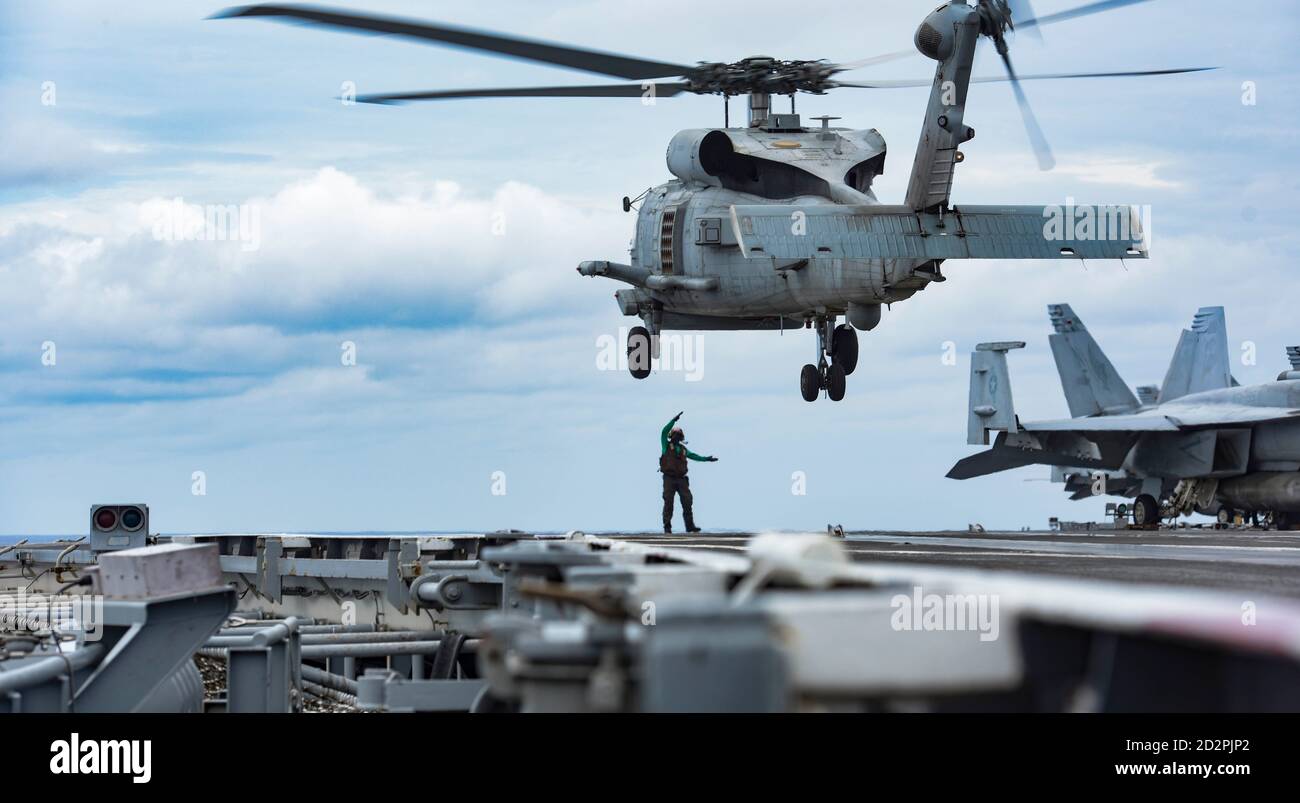 An MH-60R Sea Hawk attached to the Saberhawks of Helicopter Maritime ...