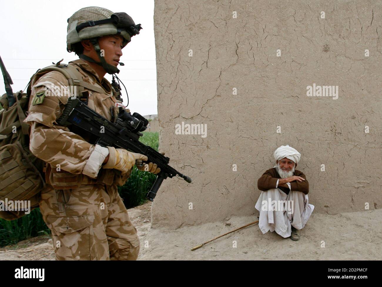 A Gurkha soldier of the British army patrols in Musa Qala, in