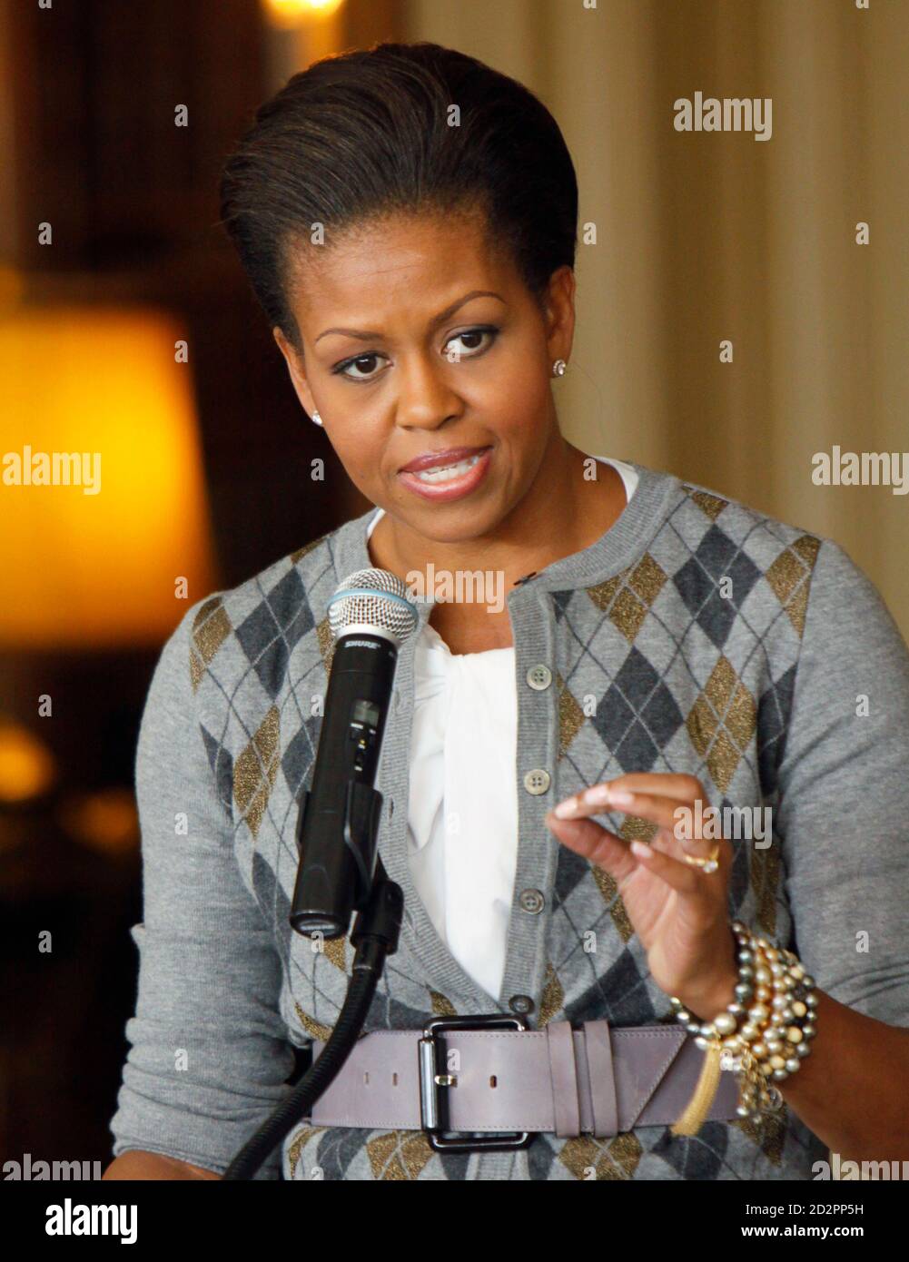 U.S. first lady Michelle Obama speaks at a Girls Mentoring Luncheon at the Governor's Mansion in Denver, Colorado November 16, 2009. REUTERS/Rick Wilking (UNITED STATES POLITICS EDUCATION) Stock Photo