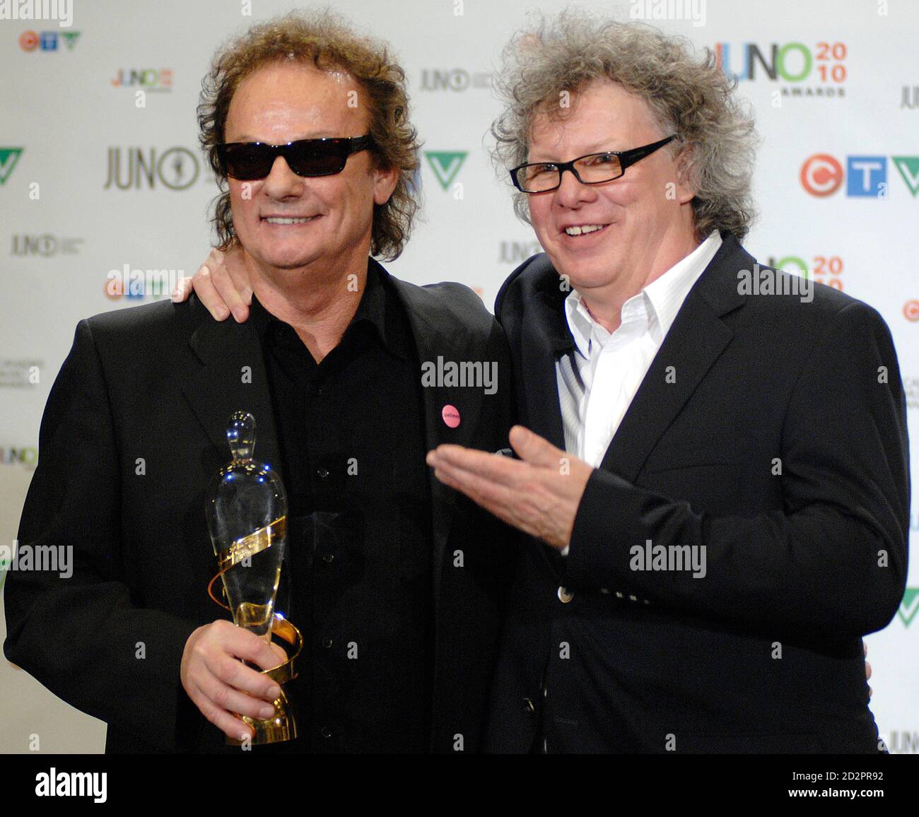 Singer Myles Goodwyn L And Brian Greenway Of April Wine Hold Their Juno Award After Being Inducted Into The Canadian Music Hall Of Fame In The Interview Room Of The St John S