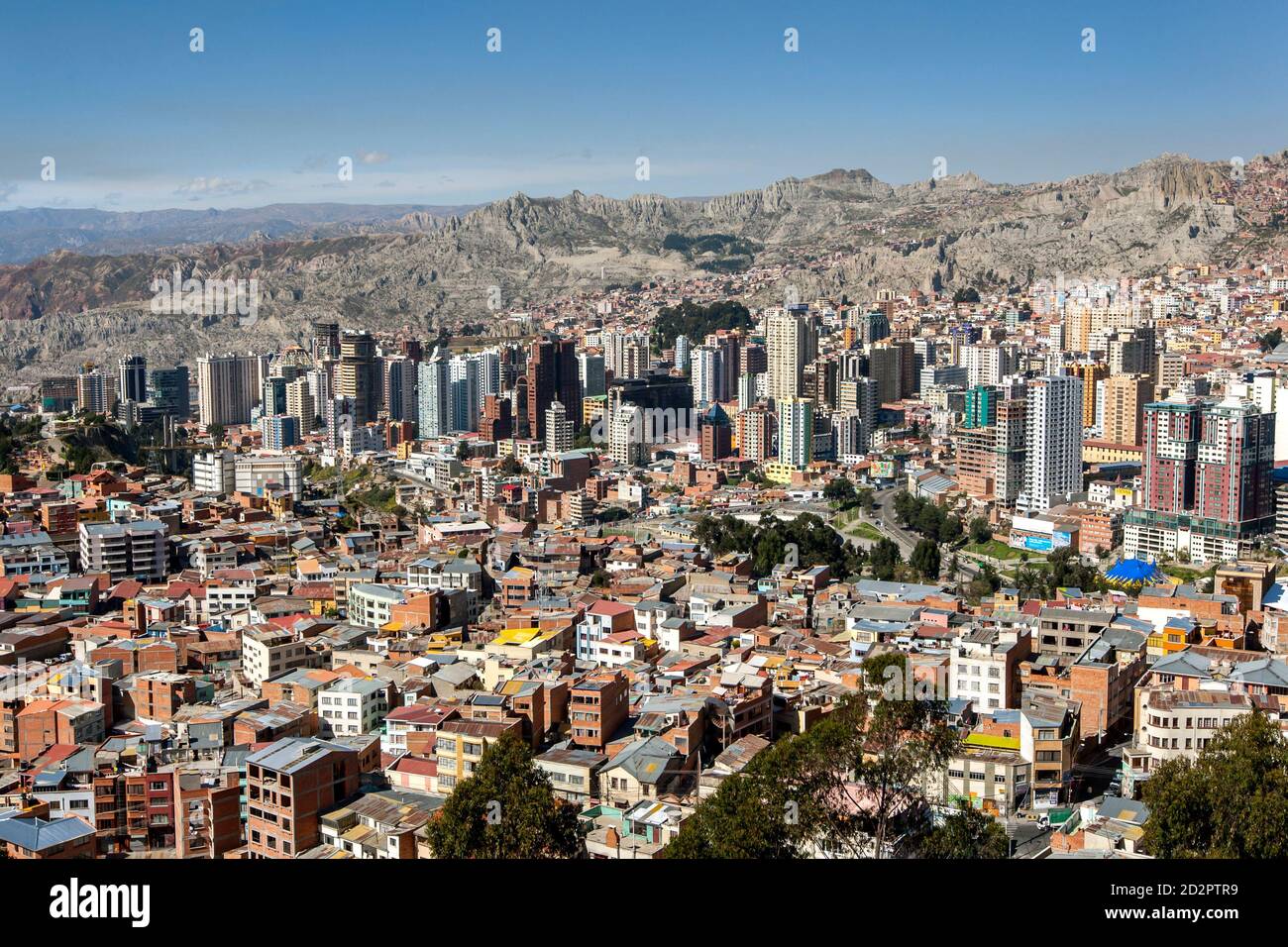 High-rise buildings dominate the La Paz skyline in Bolivia. La Paz sits at a height of 3,650 metres above sea level. Stock Photo