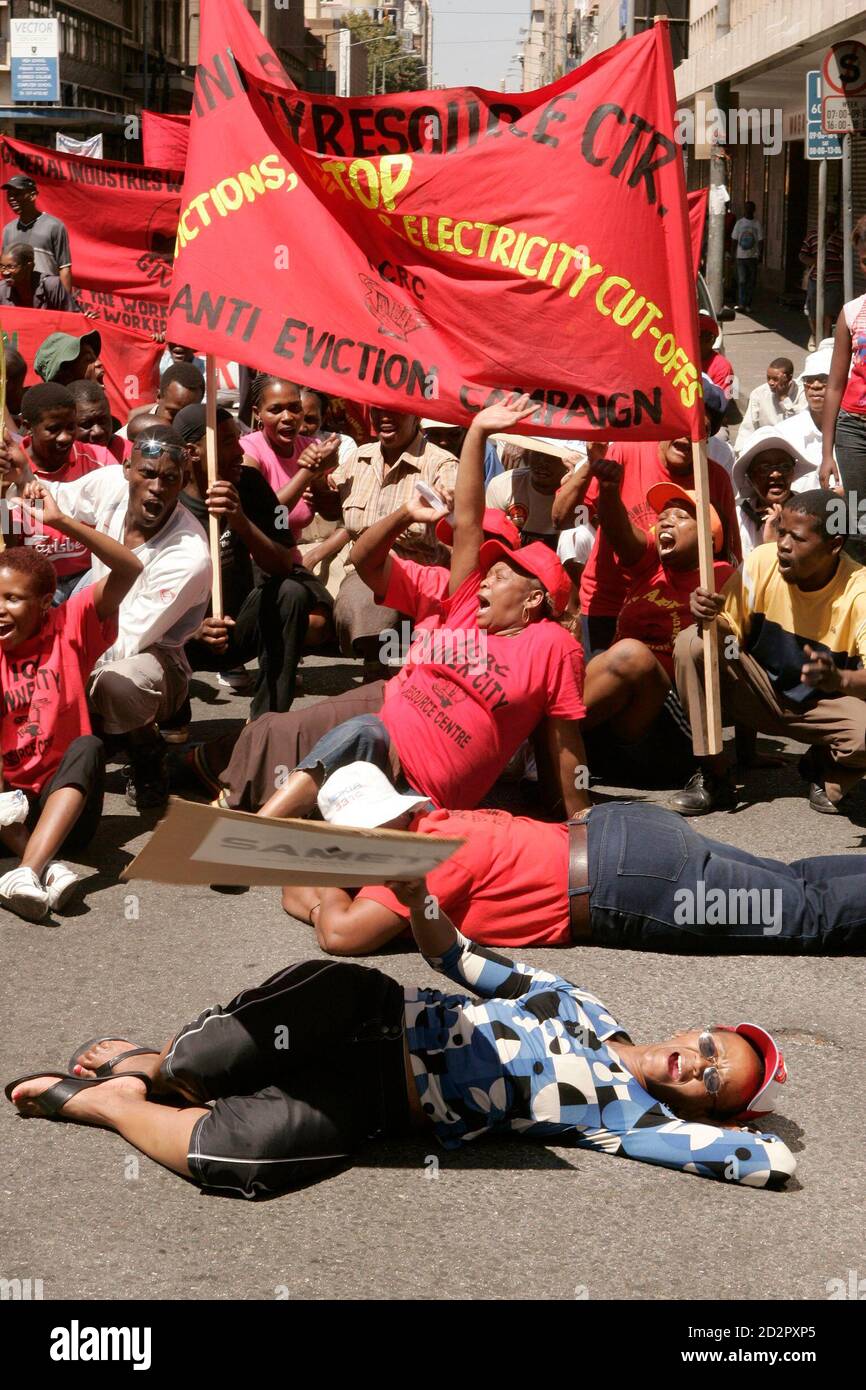 A Protester Lies On The Ground During A March In Johannesburg March 21 07 Scores Of Demonstrators Marched Through The City S Downtown On South Africa S Human Rights Day Marking The 47th Anniversary Of
