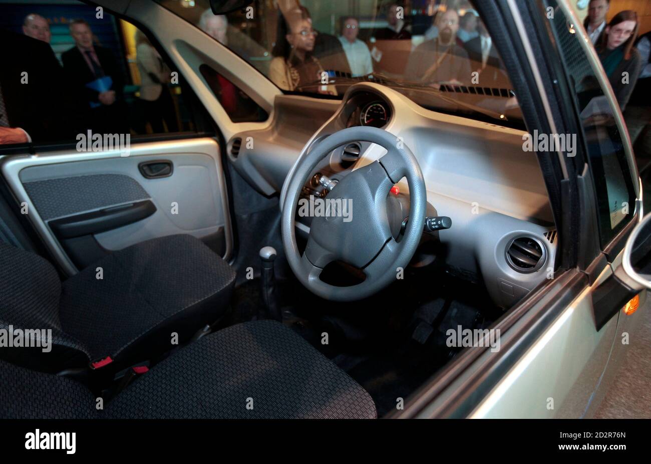 The interior of the Tata Nano is seen as the vehicle is displayed for the first time in the U.S. at the Science Center in Detroit, Michigan January 14, 2010. Unveiled last year in India by Tata Motors, the Tata Nano is targeted to families who have not previously been able to afford a car. REUTERS/Rebecca Cook  (UNITED STATES - Tags: TRANSPORT BUSINESS) Stock Photo