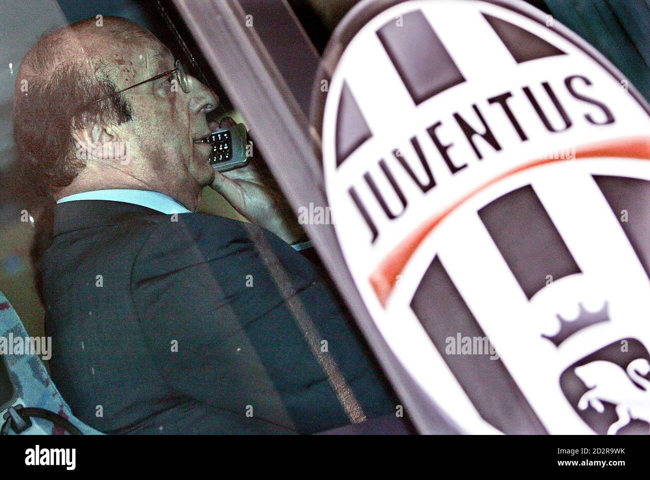Juventus' general manager Luciano Moggi talks on the phone after the club beat Reggina 2-0 to win its 29th Italian Serie A soccer championship at the San Nicola stadium in Bari, southern Italy May 14, 2006.    REUTERS/Alessandro Bianchi Stock Photo
