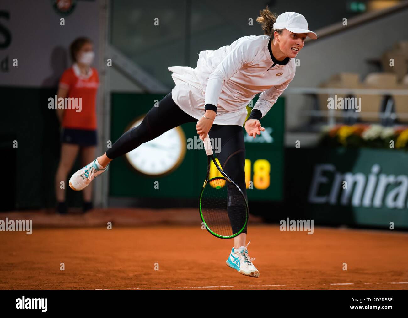 ga Swiatek of Poland in action against Martina Trevisan of Italy during the quarter-final of the Roland Garros 2020, Grand Slam tennis tournament, on Stock Photo