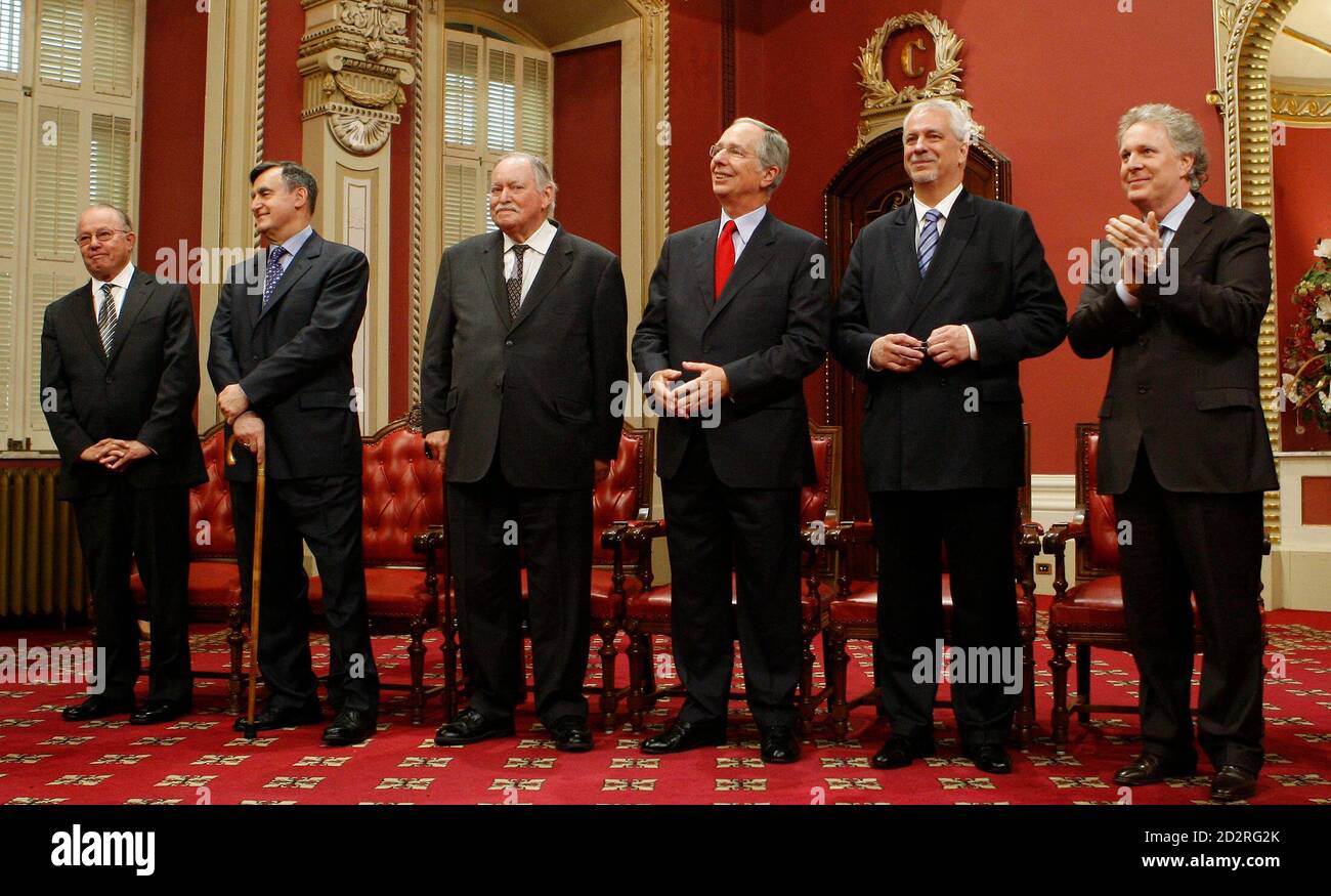 Former Quebec's Premiers Bernard Landry (L), Lucien Bouchard (2nd from L),  Jacques Parizeau (3rd from L), Daniel Johnson (4th from L) and Pierre-Marc  Johnson (5th from L) acknowledge applause before being awarded
