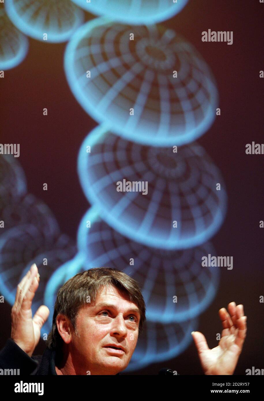 British musician Mike Oldfield gestures during a news conference at the  Guggenheim Museum in Bilbao March 6, 2008. Oldfield will perform the world  premiere of his latest work "Music of the Spheres",