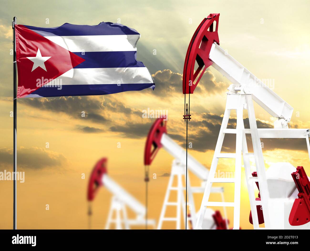 Cuba Rig Oil rigs against the backdrop of the colorful sky and a flagpole with ...