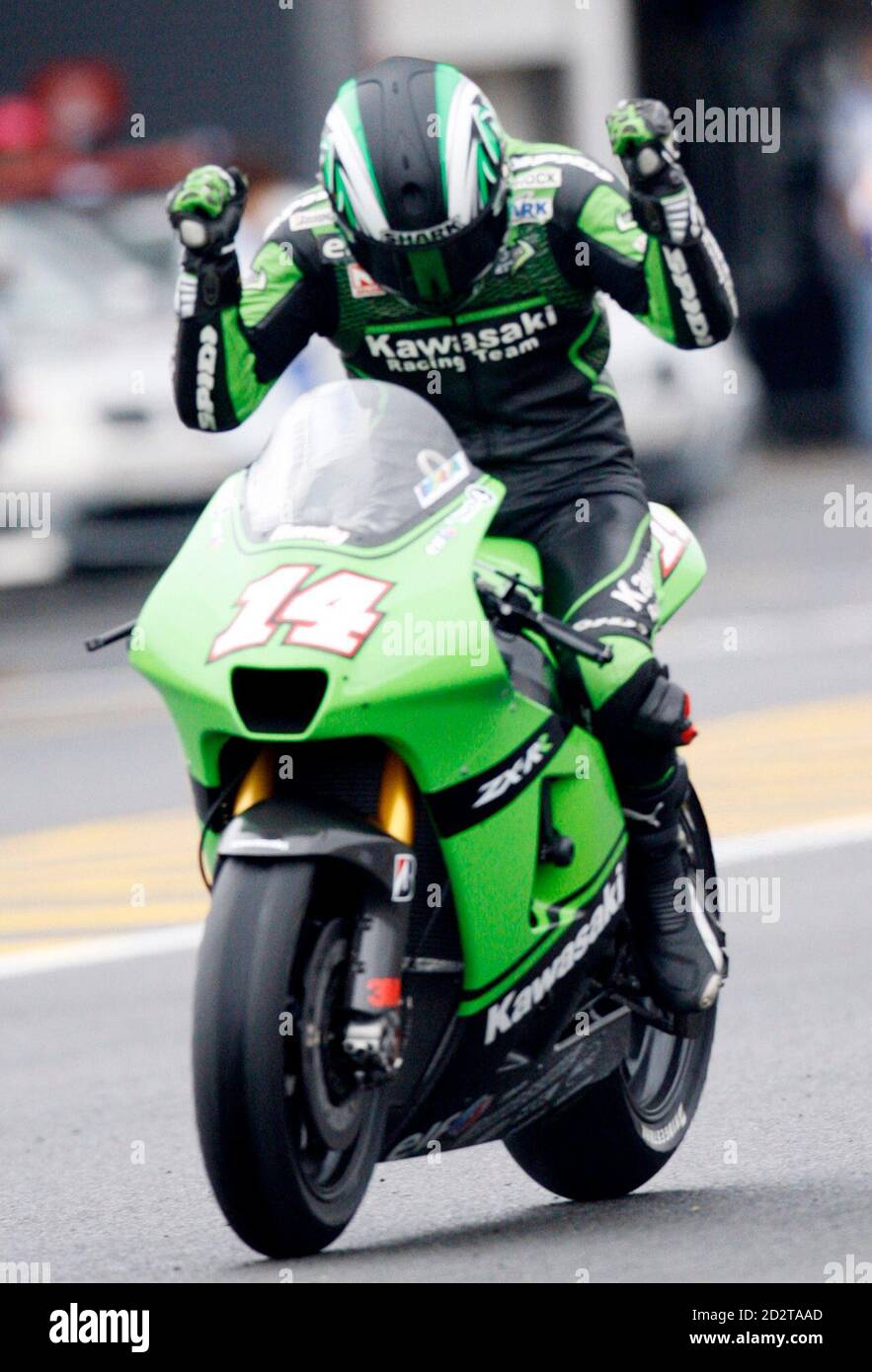 Kawasaki MotoGP rider Randy de Puniet of France reacts as he finishes the last at the Japanese Prix in Motegi, north of Tokyo September 23, 2007. de Puniet finished