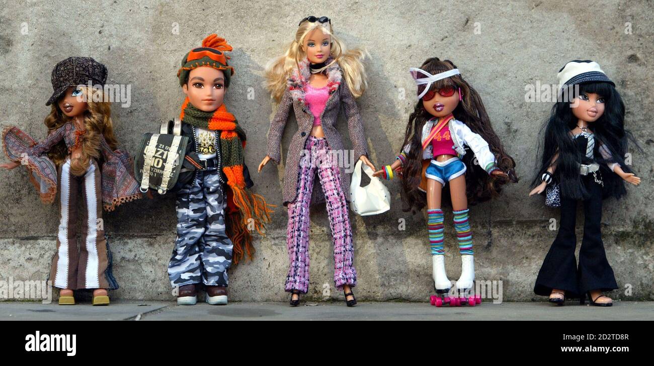 Bratz dolls and a Barbie Doll (C) are seen at the Dream Toys 2004  exhibition in London in this October 6, 2004 file photo. A California jury  awarded Mattel Inc. $100 million