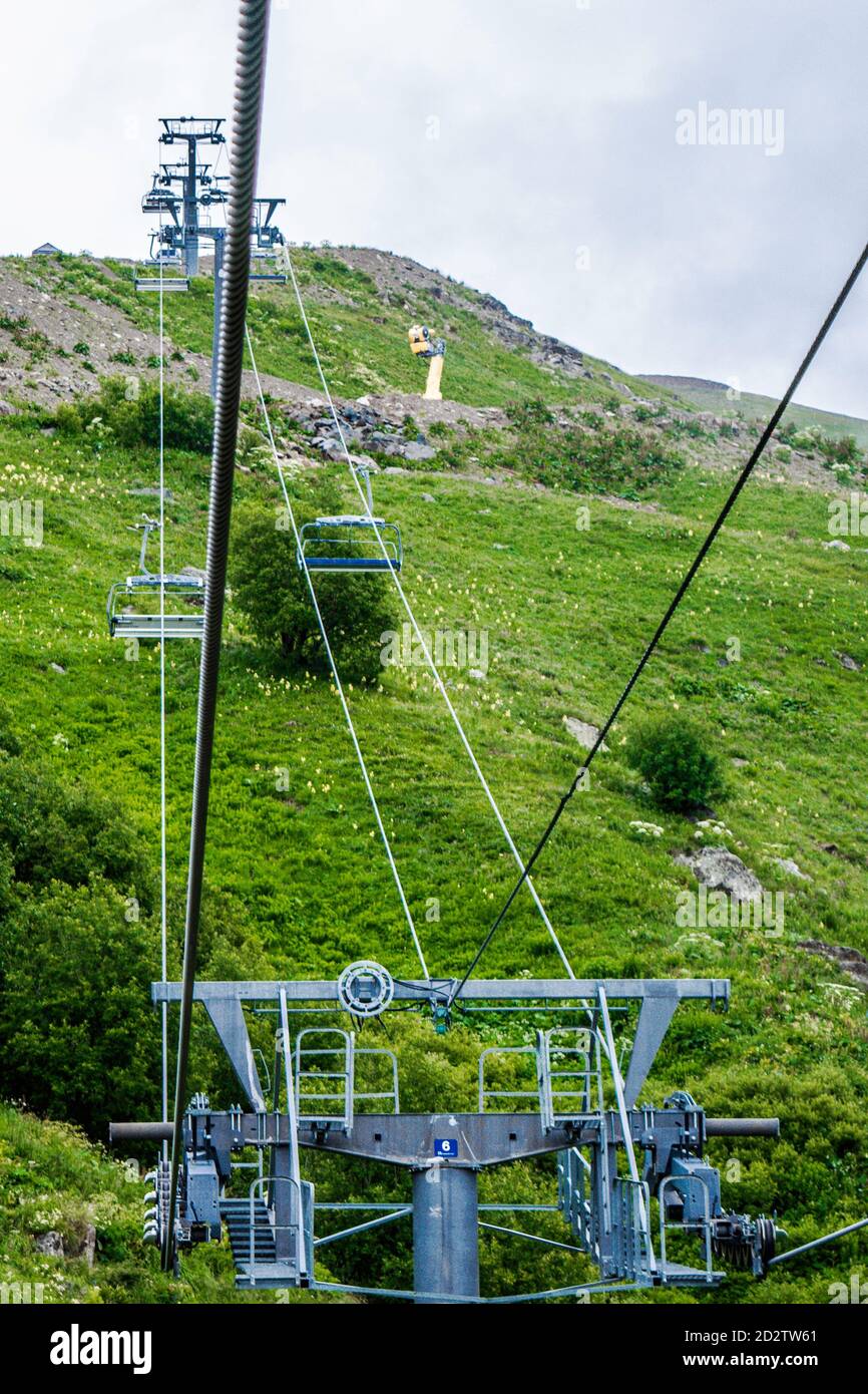 cable car on a mountain slope cable cars running up and down Stock Photo