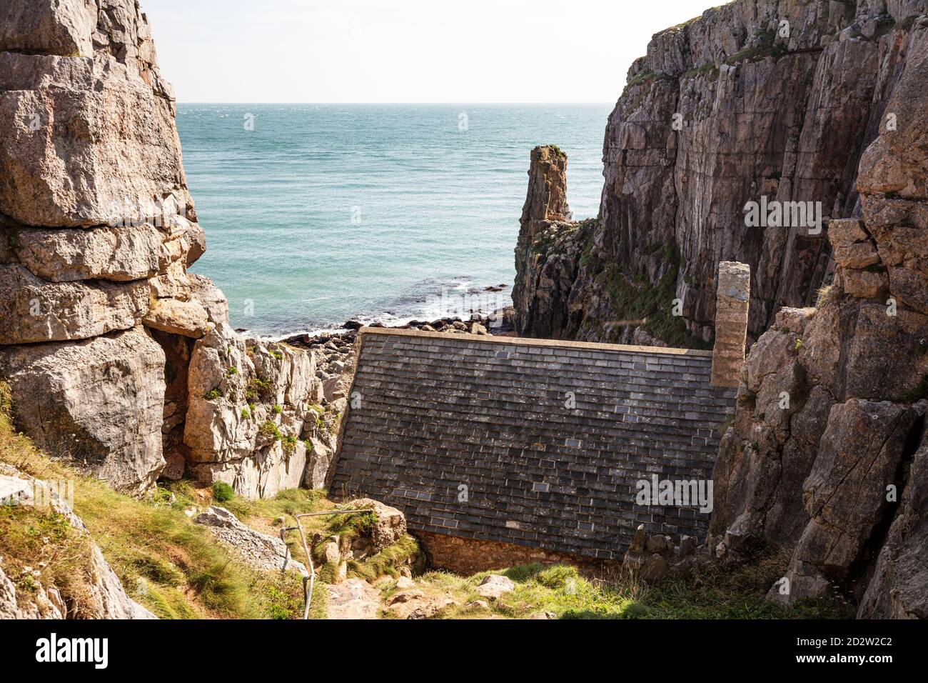 Hidden cliff side chapel of St Govan at Bosherston, Pembrokeshire ...