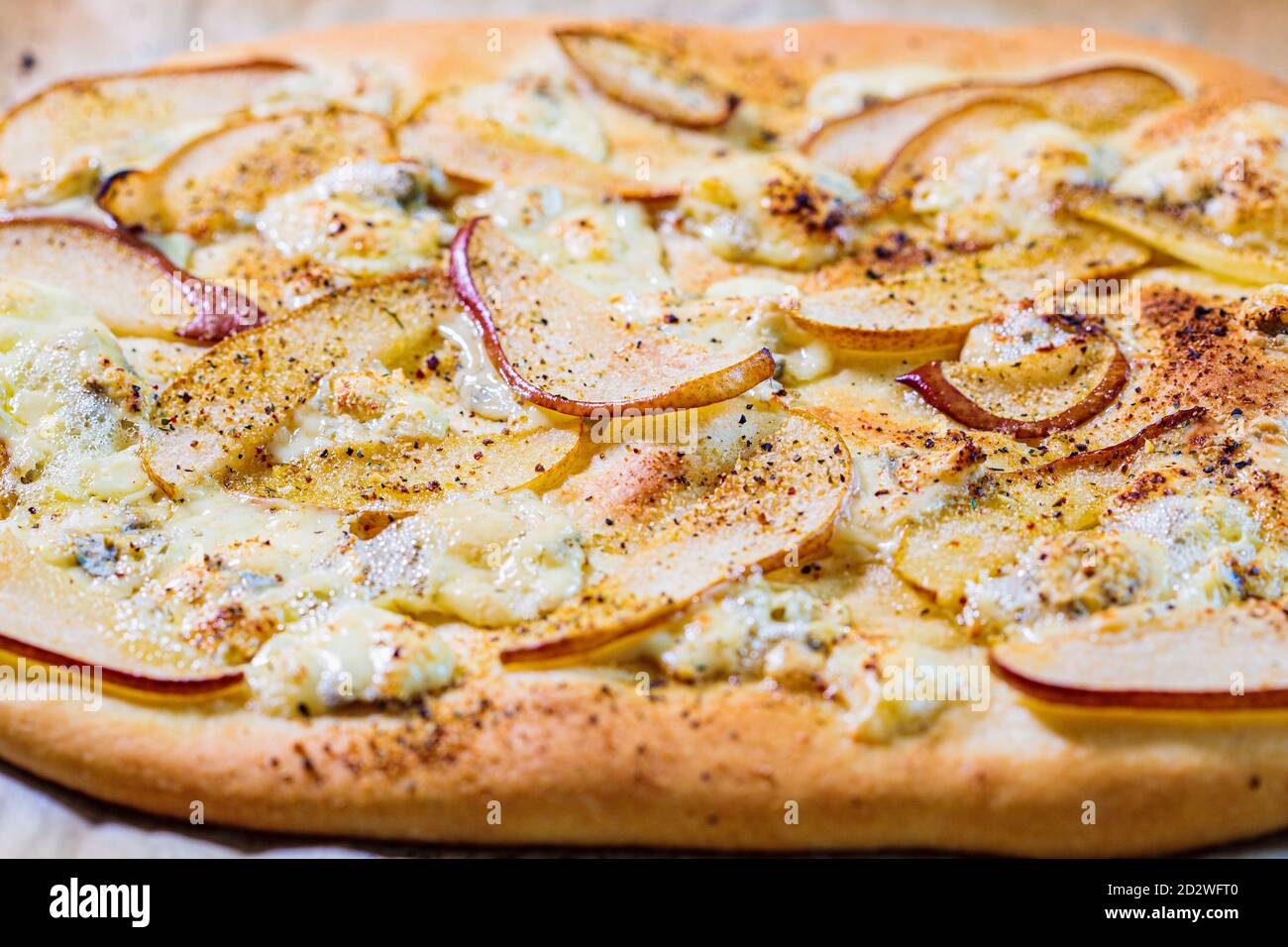 Homemade pizza with pear and cheese, gray background Stock Photo Alamy