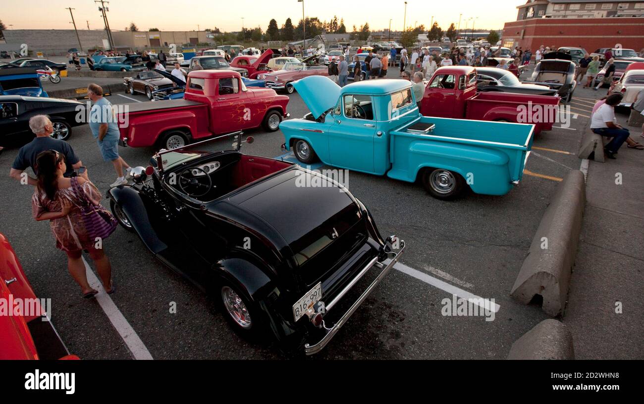 Car Enthusiasts Gather With Their Vehicles In The Parking Lot Next To A Coffee Shop In Langley British Columbia East Of Vancouver July 30 2010 Owners Of Old Classic Cars Along With