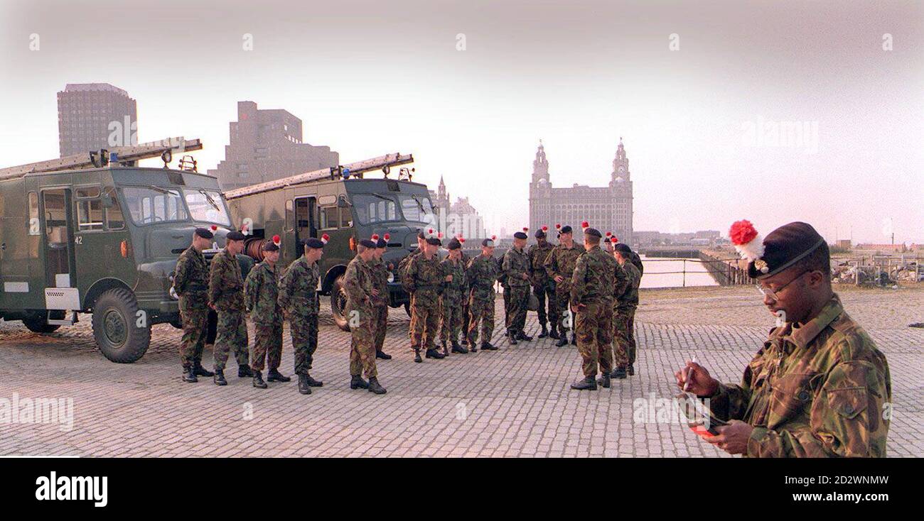 Green Goddess fire engines in Liverpool today (Thursday) as fire men there stage a nine-hour strike over manning levels. The army engines, more than 40-years-old and so-called because of their green livery, are being manned by soldiers from the Royal Regiment of Fusiliers. Stock Photo
