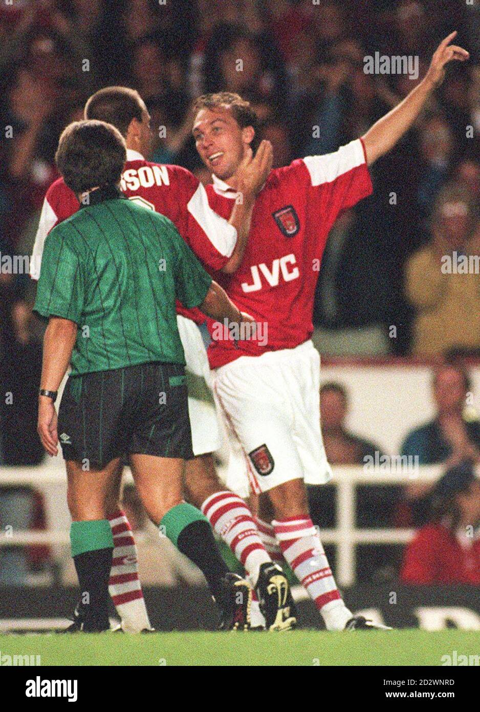 David Platt is congratulated by teammate Paul Merson after scoring for Arsenal the Premiership match against Nottingham Forest at Highbury. Stock Photo