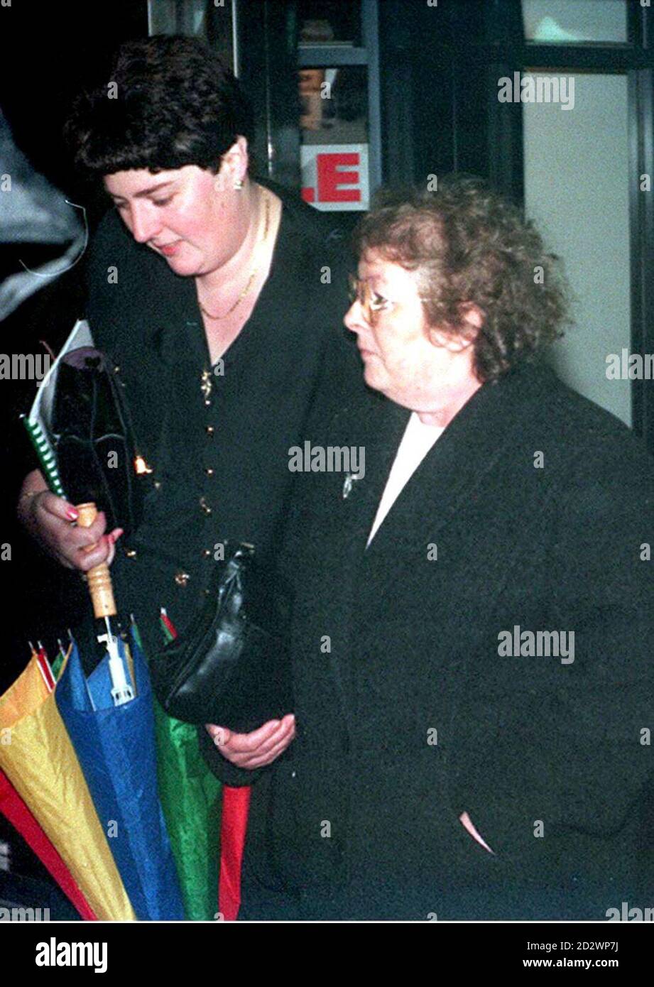 BHAM 2: BIRMINGHAM: 17.01.95: Pat Dunn leaves Birmingham County Court  today (Tuesday) with  her daughter Debbie Doyle,  where she is locked in a fierce legal battle with the mistress of her late  husband Ken Dunn,  over the right to be buried with him.  Mr Dunn died of a heart attack in 1991 in the arms  of his mistress Jean Cooper, for 16 years before his death both women shared his companionship, fully  aware of each others existence. WATCH FOR PA STORY. PA NEWS, David Jones. Stock Photo