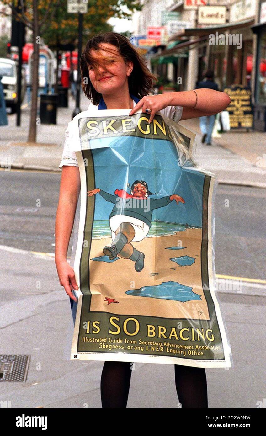 A Windswept Rebecca Fox Auctioneers Assistant From Fulham London Holds The Original Artwork Of One Of Britain S Most Famous Posters Skegness Is So Bracing By John Hassell The Artwork Is Expected To