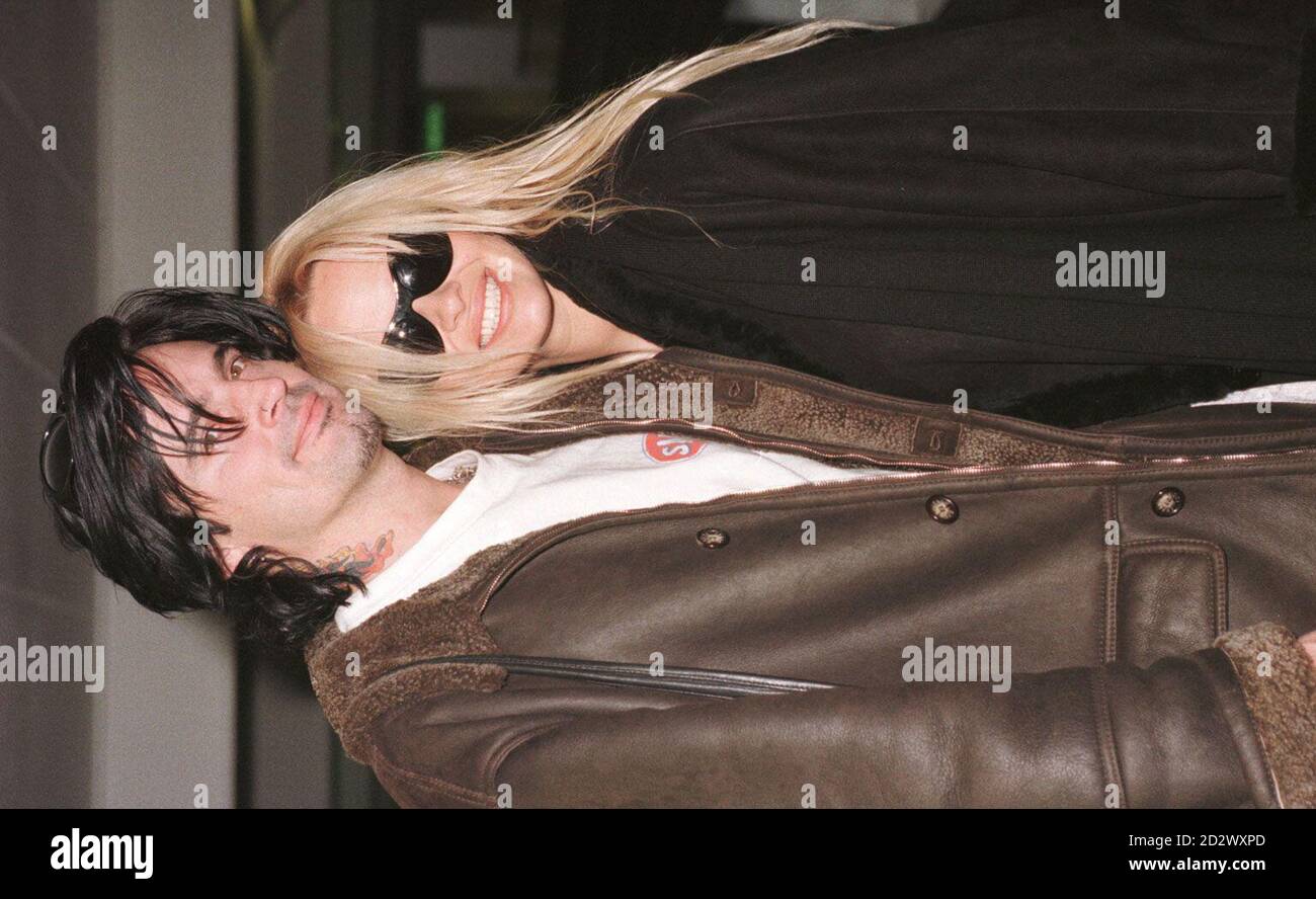 Baywatch' star Pamela Anderson with her husband Tommy Lee at Heathrow Airport before departing for Los Angeles, after spending Christmas and the New Year in Europe. 20/11/96: Pamela Anderson Lee, has filed for divorce from her rock drummer husband, after only 21 months of marriage. According to the divorce papers, they separated last Friday. The petition specified that Anderson Lee would seek custody of her son, five-month-old son, Brandon Thomas Lee. 25/02/98: Tommy Lee was in custody after being arrested by police in Malibu on suspicion of spousal assault. The Motley Crue drummer was a Stock Photo