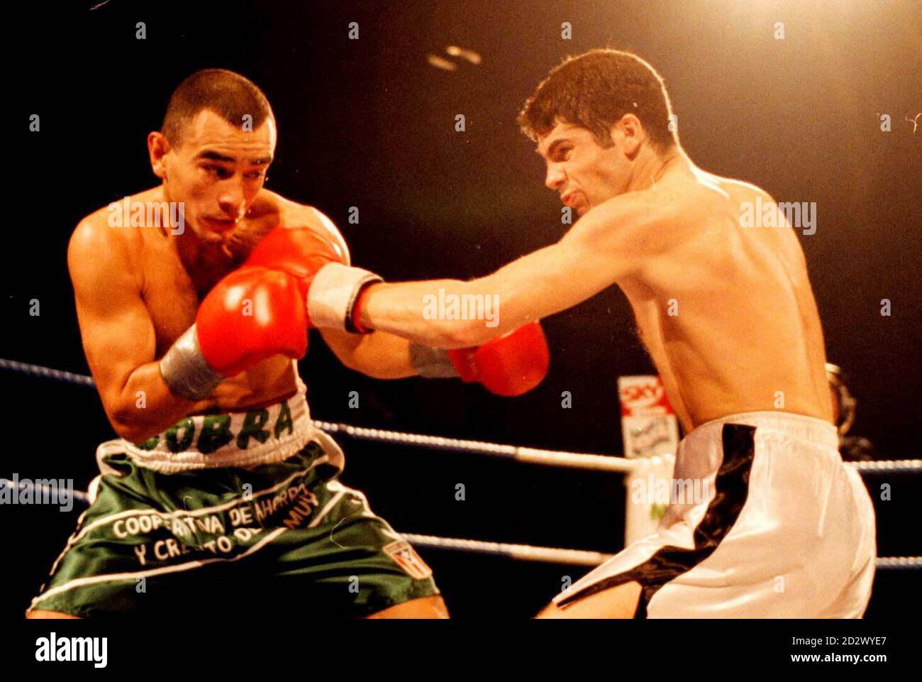 Daniel Jiminez (left) battles it out with Drew Docherty before retaining his WBO Bantamweight title at the Mansfield Leisure Centre. It was Docherty's first fight since James Murray died after a bout last year. Stock Photo