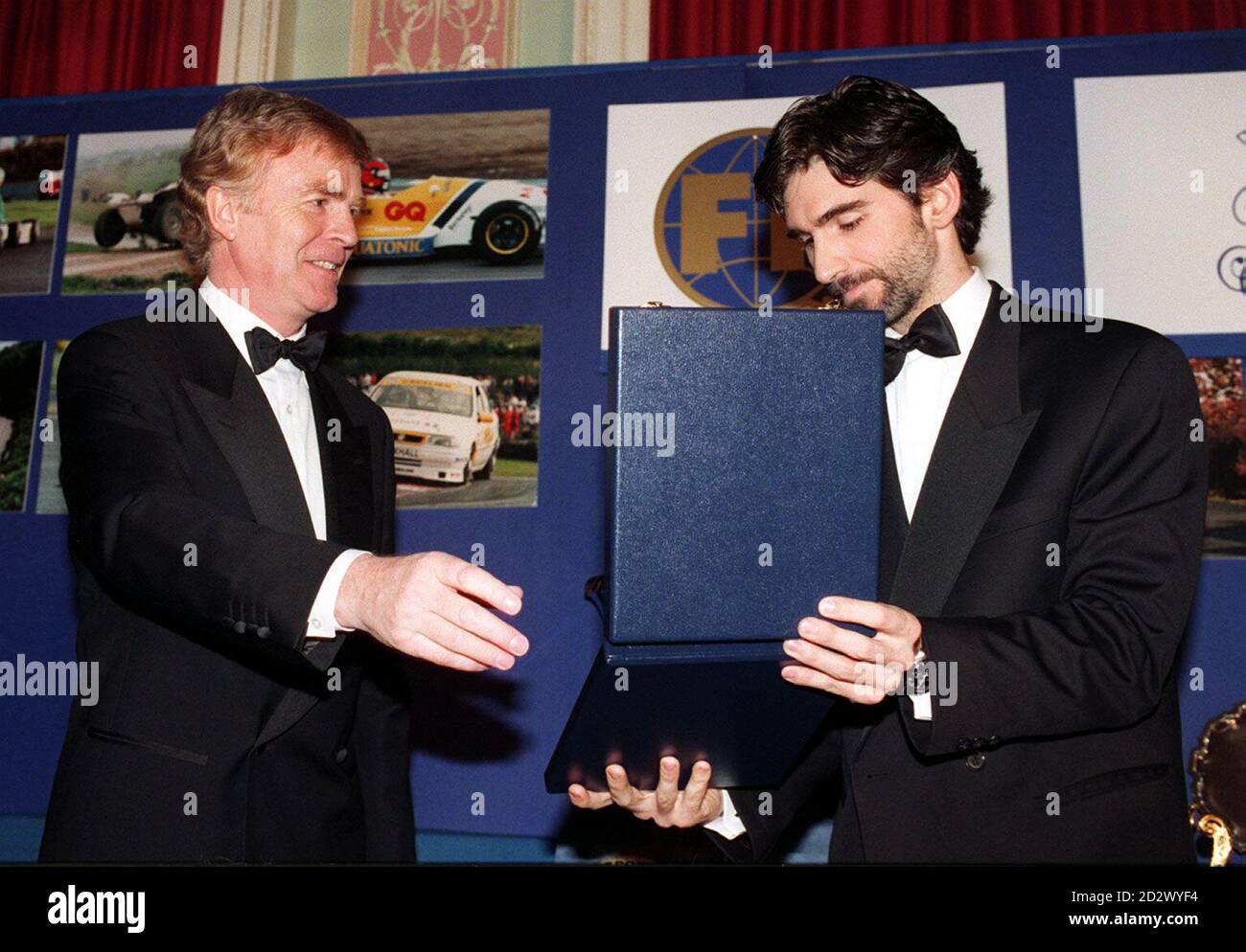 Britain's Damon Hill, 35, (right) is presented with the FIA Formula 1 World  Championship 2nd overall award by Federation de l'Automobile President, Max  Mosley, in London Stock Photo - Alamy