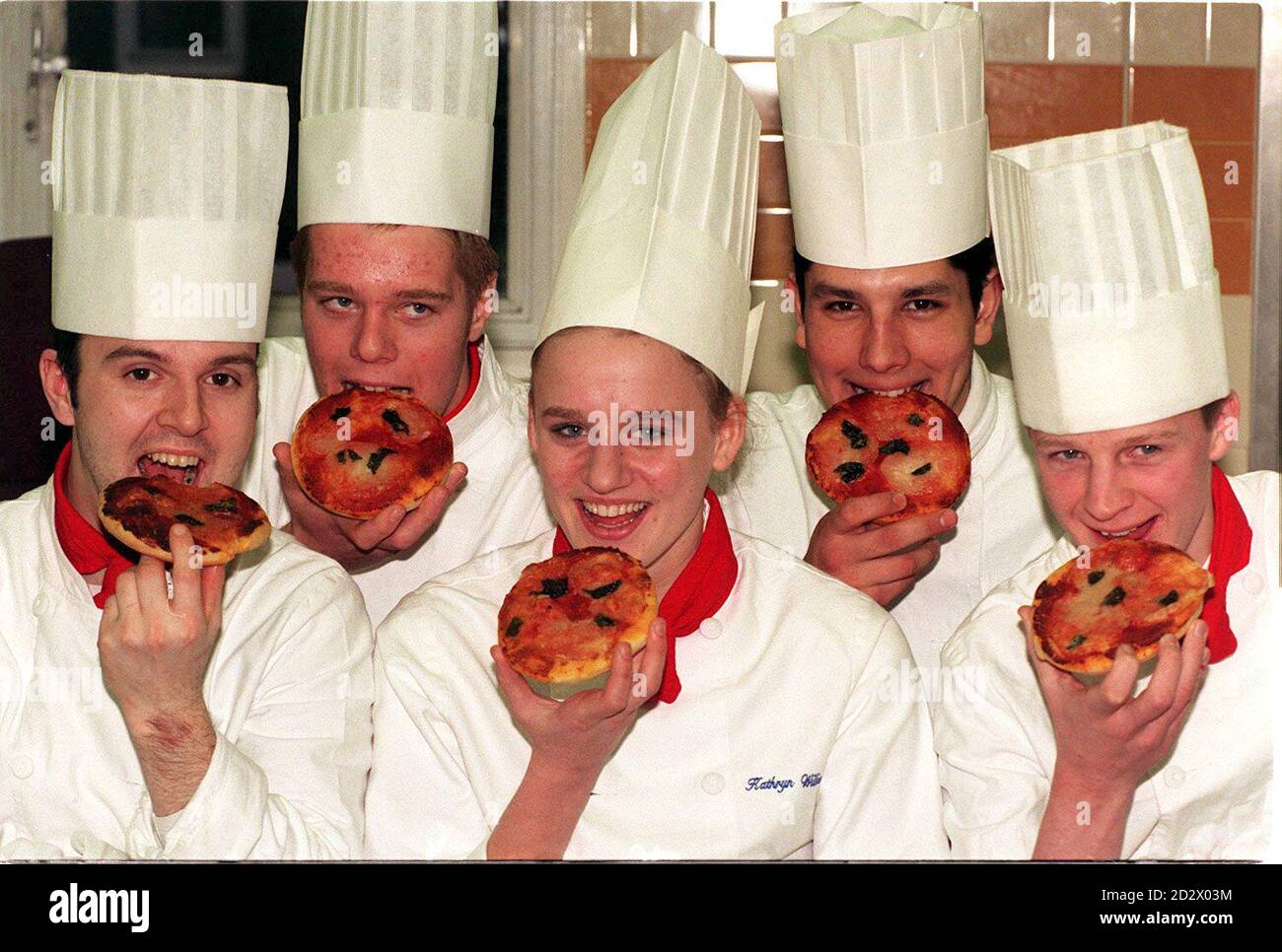 Some of the panel of six students from Westminster College, London, tasting pizzas made with both regular and the genetically engineered tomato pastes. The general public can taste the genetically produced fruit puree from tomorrow - the first inthe world to be made commercially - as it goes on sale in Safeway and Sainsbury's stores. Stock Photo