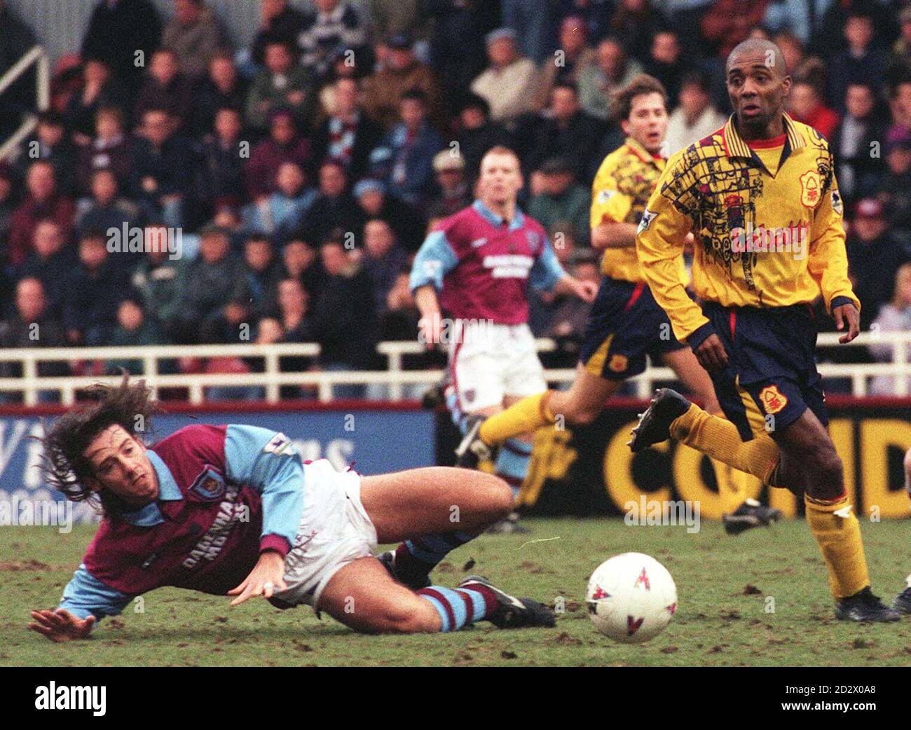 West Ham's Ian Bishop slides to beat Notts Forest's Brian Roy to the ball in today's (Saturday) Premiership match at Upton Park.  Stock Photo