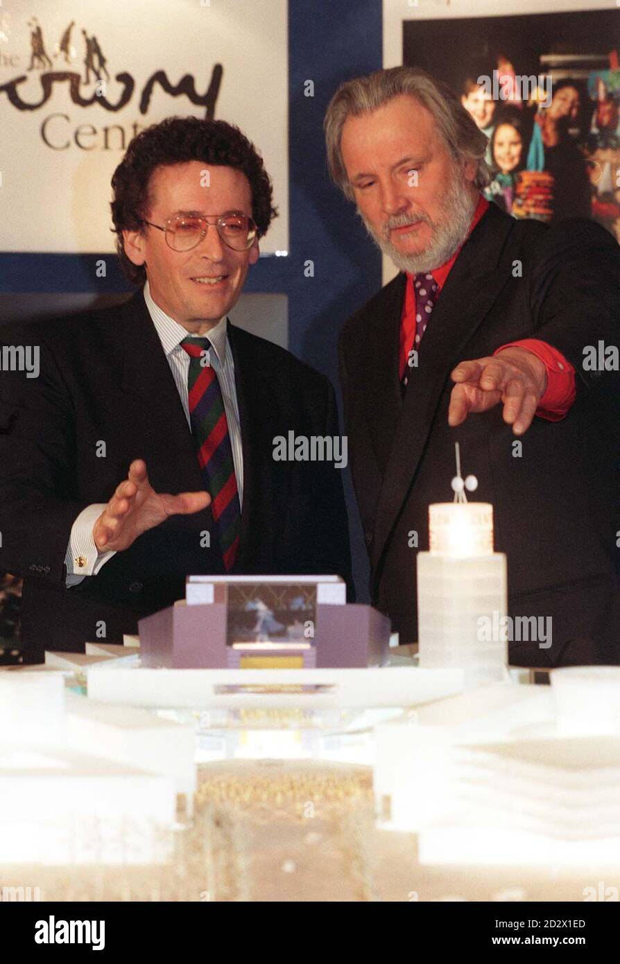 Architect Michael Wilford shows actor and Lowry patron Robert Powell a model of the proposed  127 million Lowry Centre unveiled in London today (Thursday). The new centre, to be built at Salford, Gtr Manchester, will be partly funded with  64 million from the lottery fund.  Stock Photo