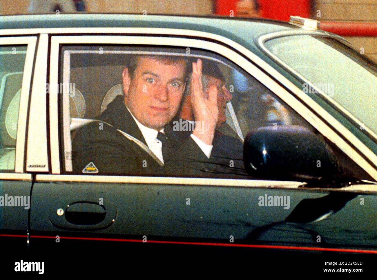 Duke of York waves as he drives away from Weymouth Railway Station. The duke and his wife, the Duchess of York, will have their decree absolute granted at the High Court.  * 22/07/02 : Duke of York, who, it was claimed has been let off by a traffic policeman for speeding.  The Sun reports that the Prince was allegedly caught doing around 60mph in 40mph zone near Heathrow Airport in London while rushing to catch a flight so he could watch The Open golf championships in Scotland.    The newspapers say that the Duke of York, 43,  did not get out of his Range Rover but his personal bodyguard, a po Stock Photo