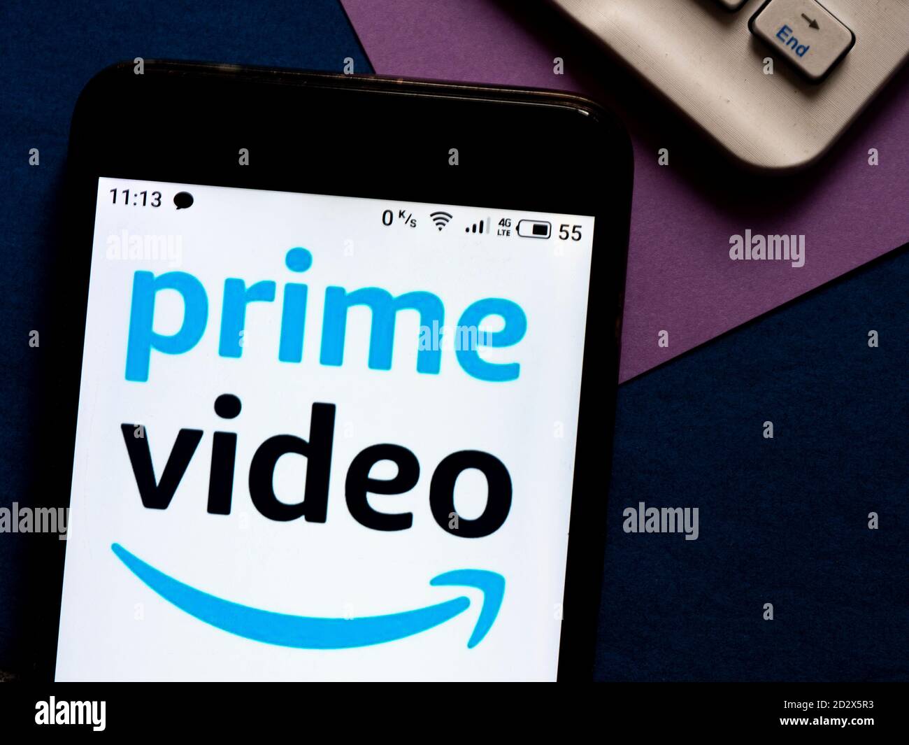 In this photo illustration an  Amazon Prime Video appliance by AMZN Mobile LLC logo is seen displayed on a smartphone Stock Photo