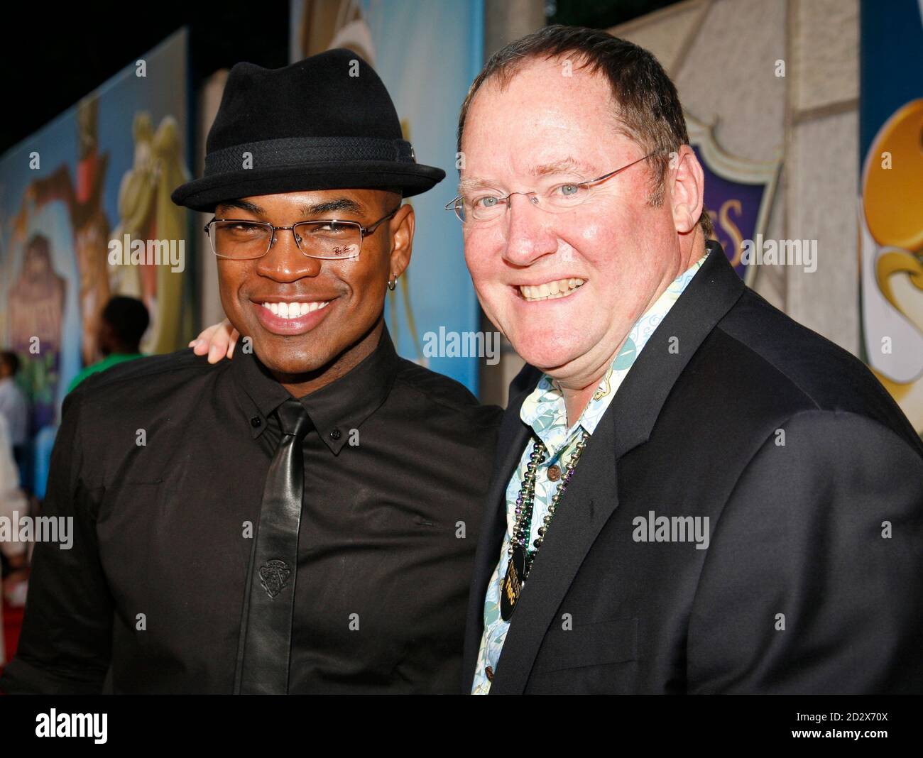Musician Ne-Yo (L) and Pixar and Disney Animation Studios CEO John Lasseter arrive for the premiere of Musician Ne-Yo (L) and Pixar and Disney Animation Studios CEO John Lasseter arrive for the premiere of