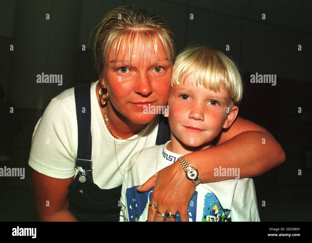 Michelle Cash with her six year-old son Damien at Manchester Airport ...