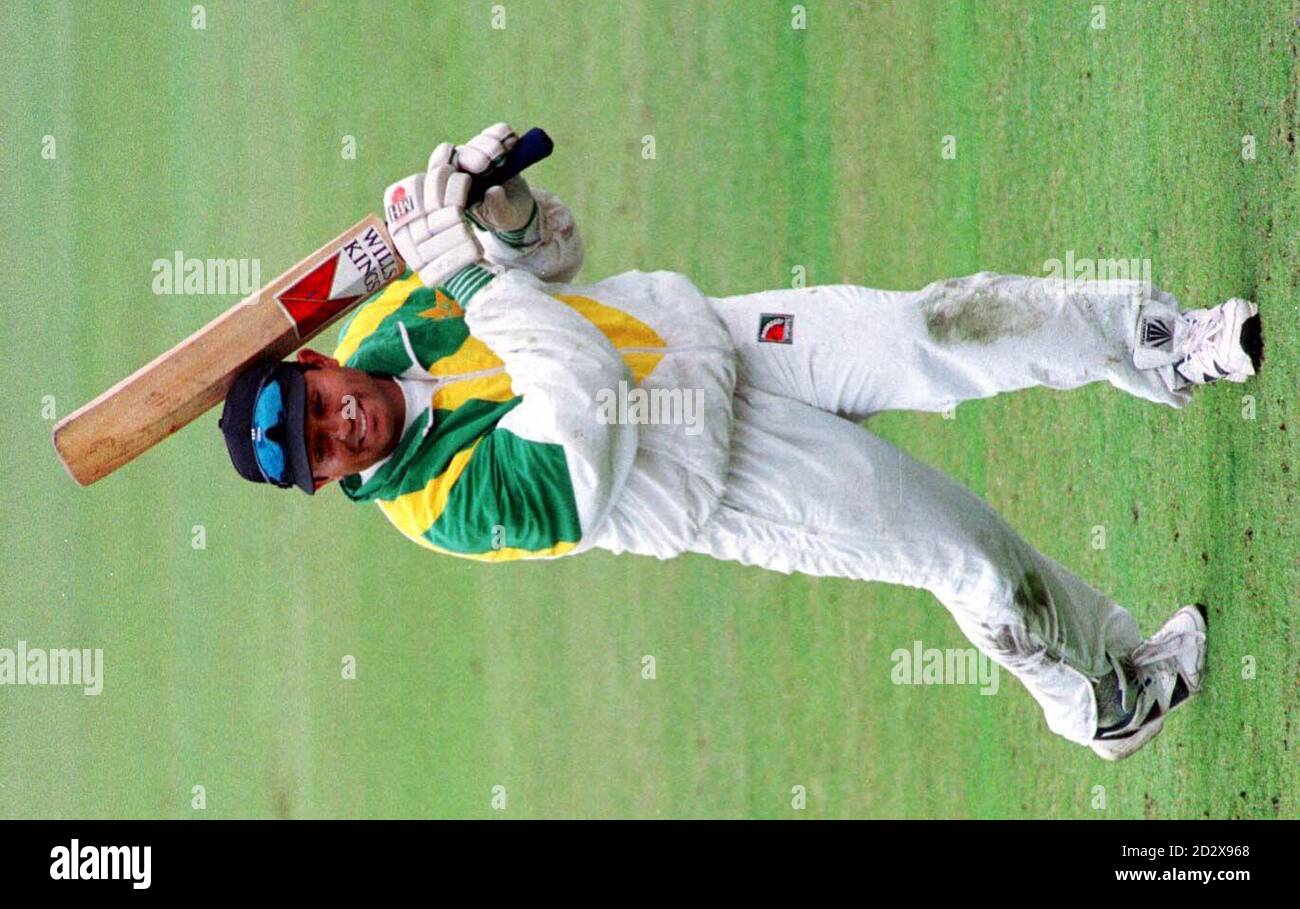 Pakistan leg spinner Mushtaq Ahmed displays his batting skills, during