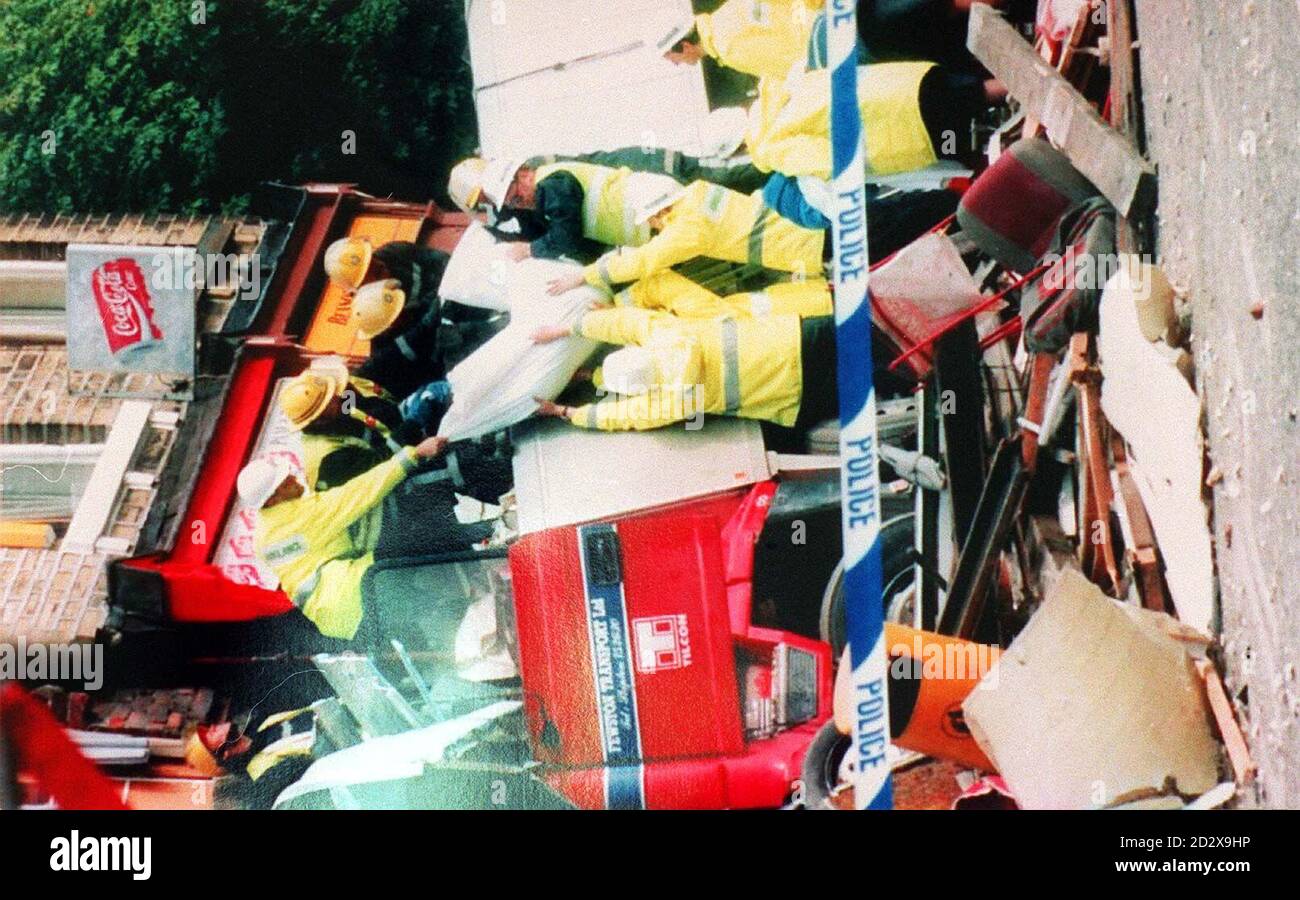 PA Library photo dated 06.09.93 (256783-4) : Rescue services recover victims from the scene of an accident at Sowerby Bridge, West Yorkshire after an out of control lorry ploughed into a BT van and and shopfront killing six people and the driver of the lorry. An employee of a firm which owned a the lorry is to be charged with manslaughter, police said today. News that West Yorkshire police are to start proceedings against an employee of the now-defunct Fewston Transport comes on the third anniversary of the tragedy in Sowerby Bridge. See PA Story POLICE Lorry. PA Photos Stock Photo