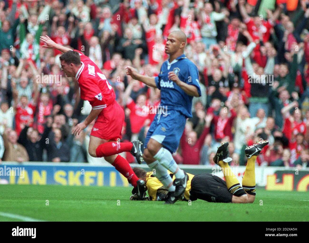 Liverpool's Robbie Fowler wheels away to celebrate his first goal in his side's 5-1 demolition of Chelsea at Anfield this afternoon (Saturday). PA. Stock Photo